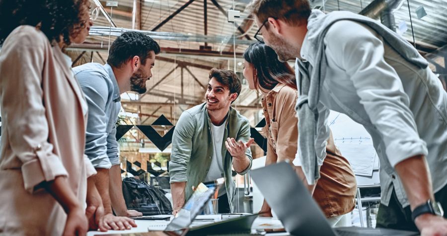 Founders reviewing startup insurance requirements with a broker
